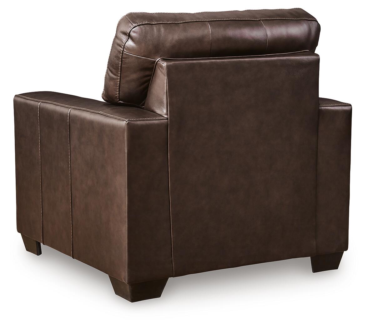 Rear view of a dark brown leather club chair.