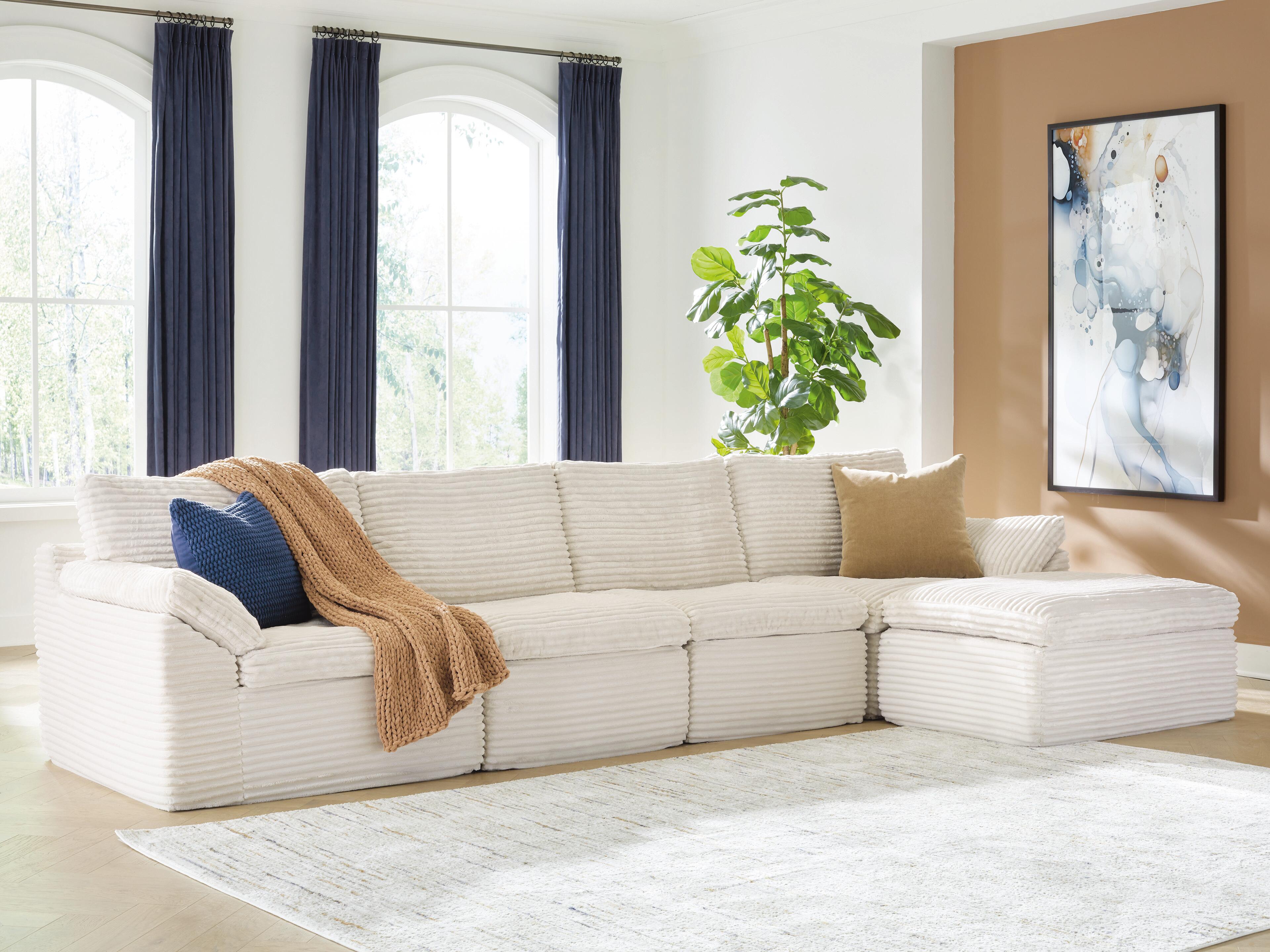 Canefield 4-Piece Sectional with Ottoman - image 5