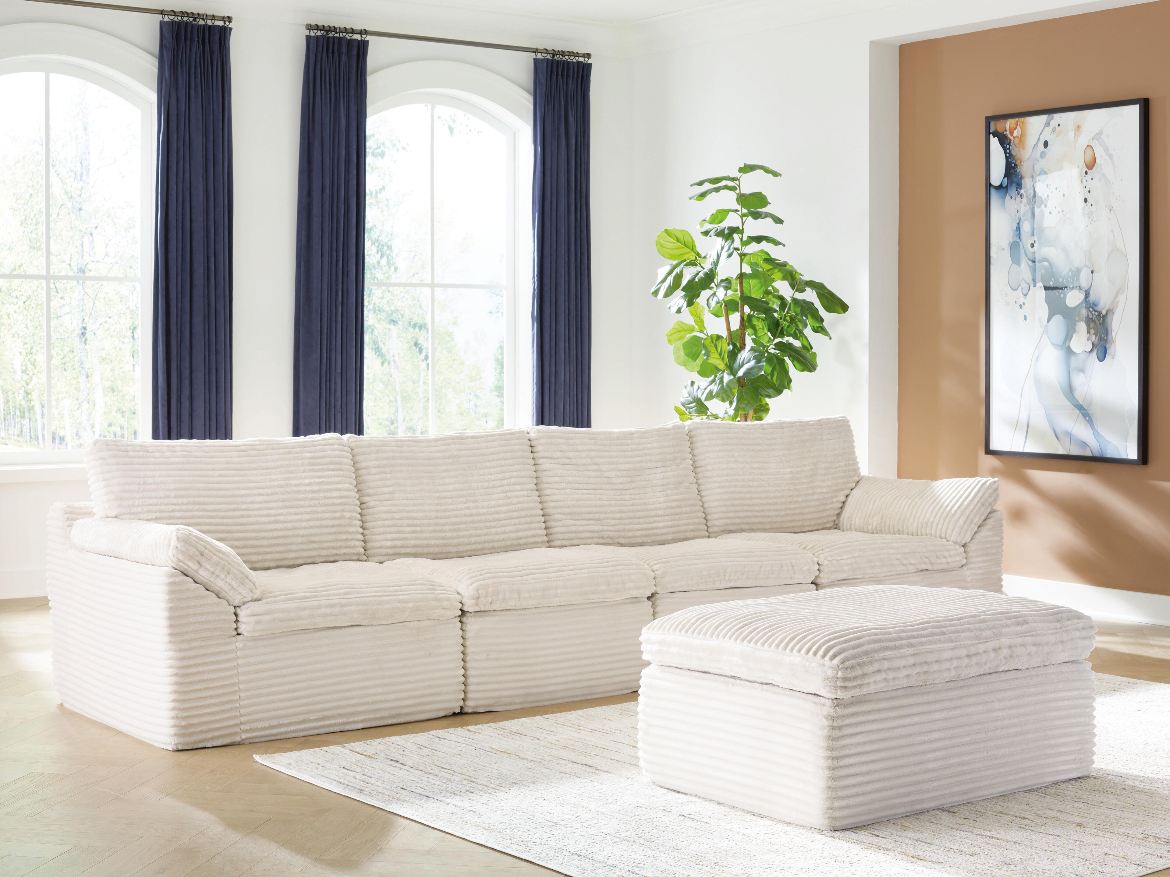 Canefield 4-Piece Sectional with Ottoman - image 3