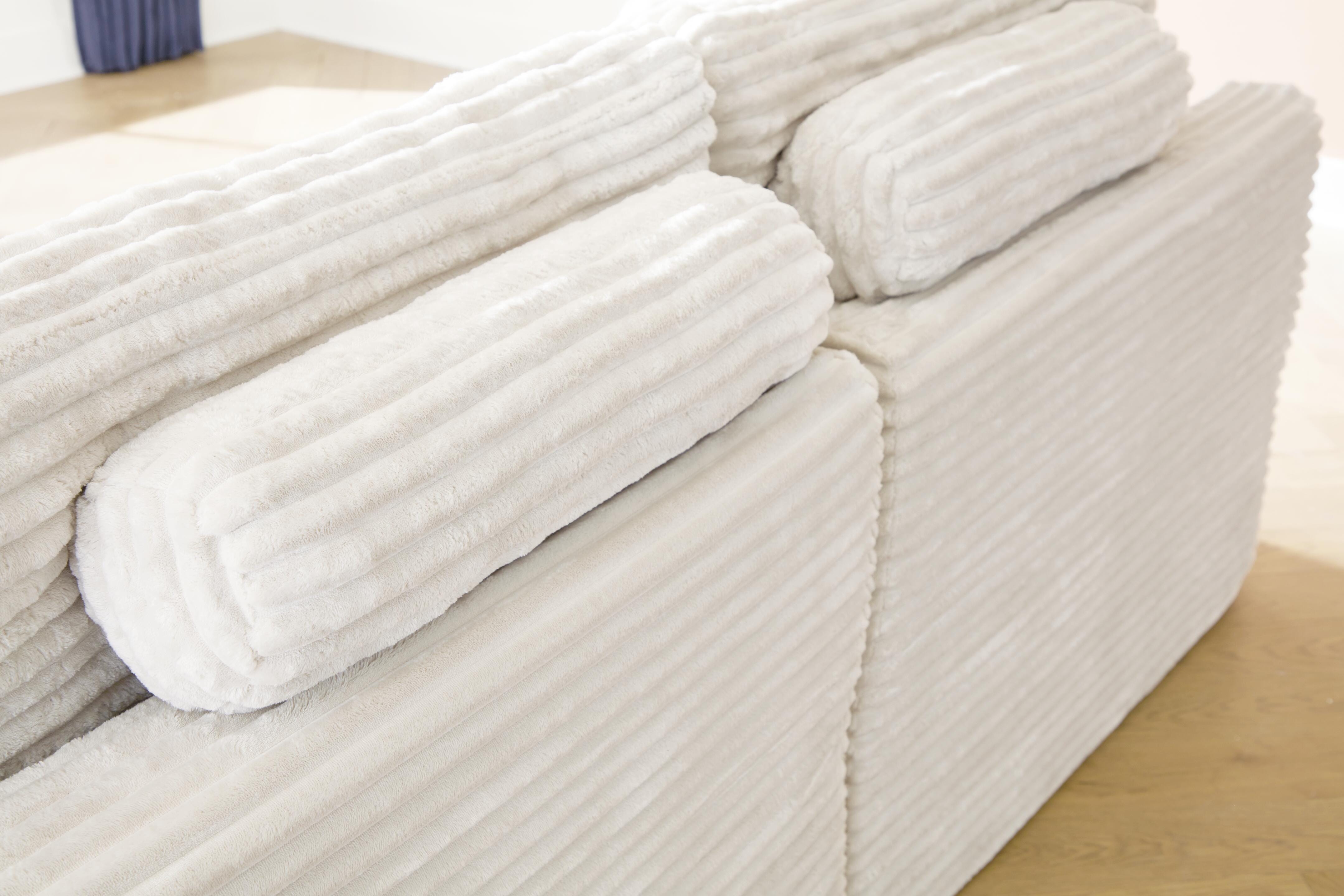 Canefield 4-Piece Sectional with Ottoman - image 7