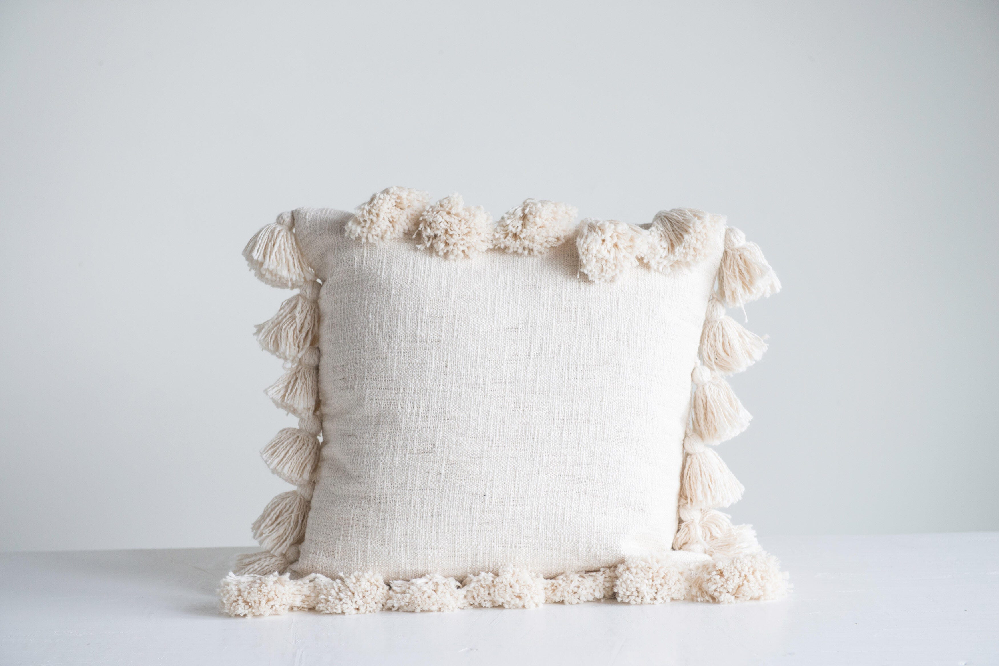 Storied Home Tasseled Decorative Throw Pillow, Cream, large