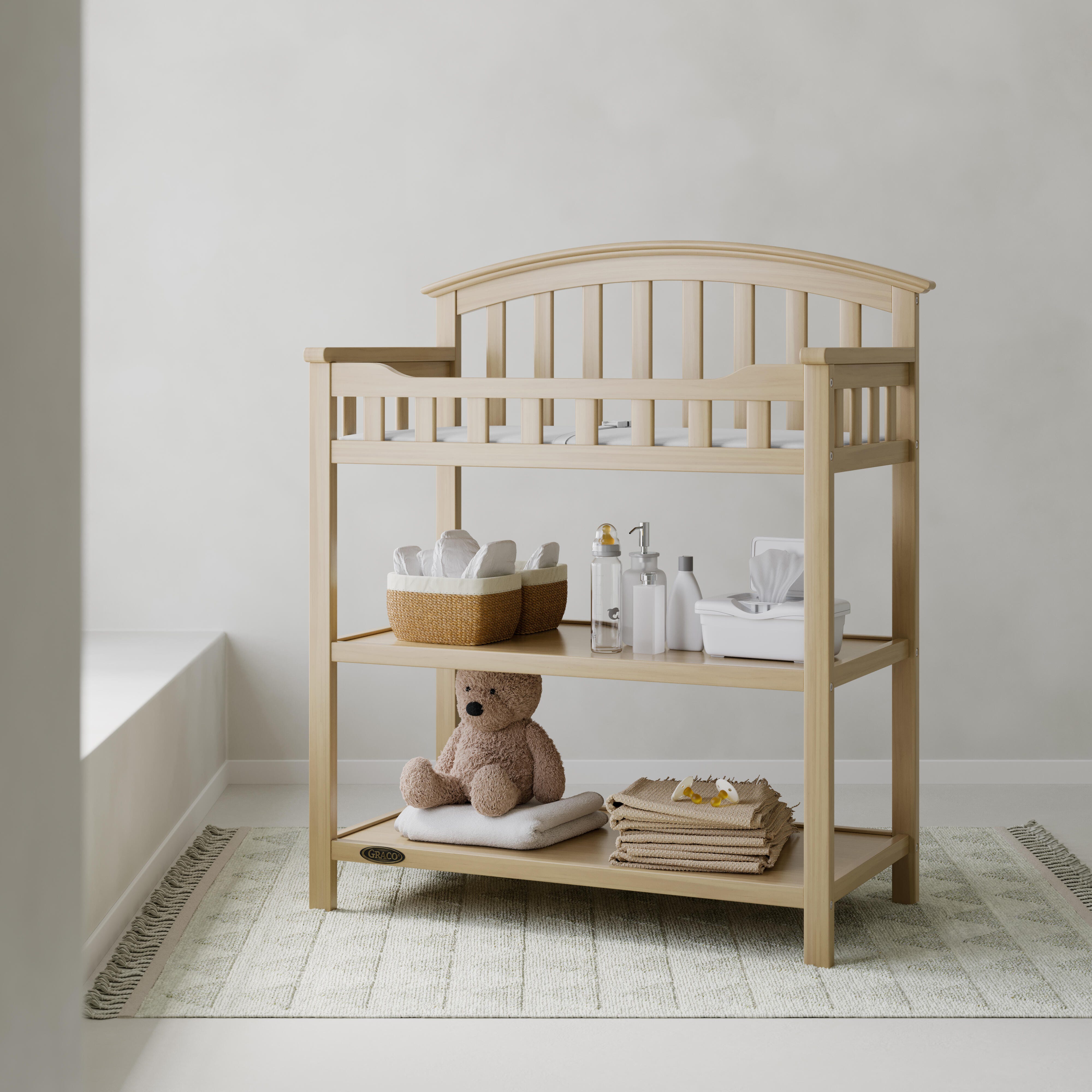 Graco Changing Table, Driftwood, rollover