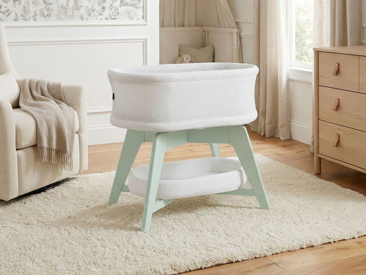 TruBliss Evi Smart Bedside Bassinet, White/Mint Green, rollover