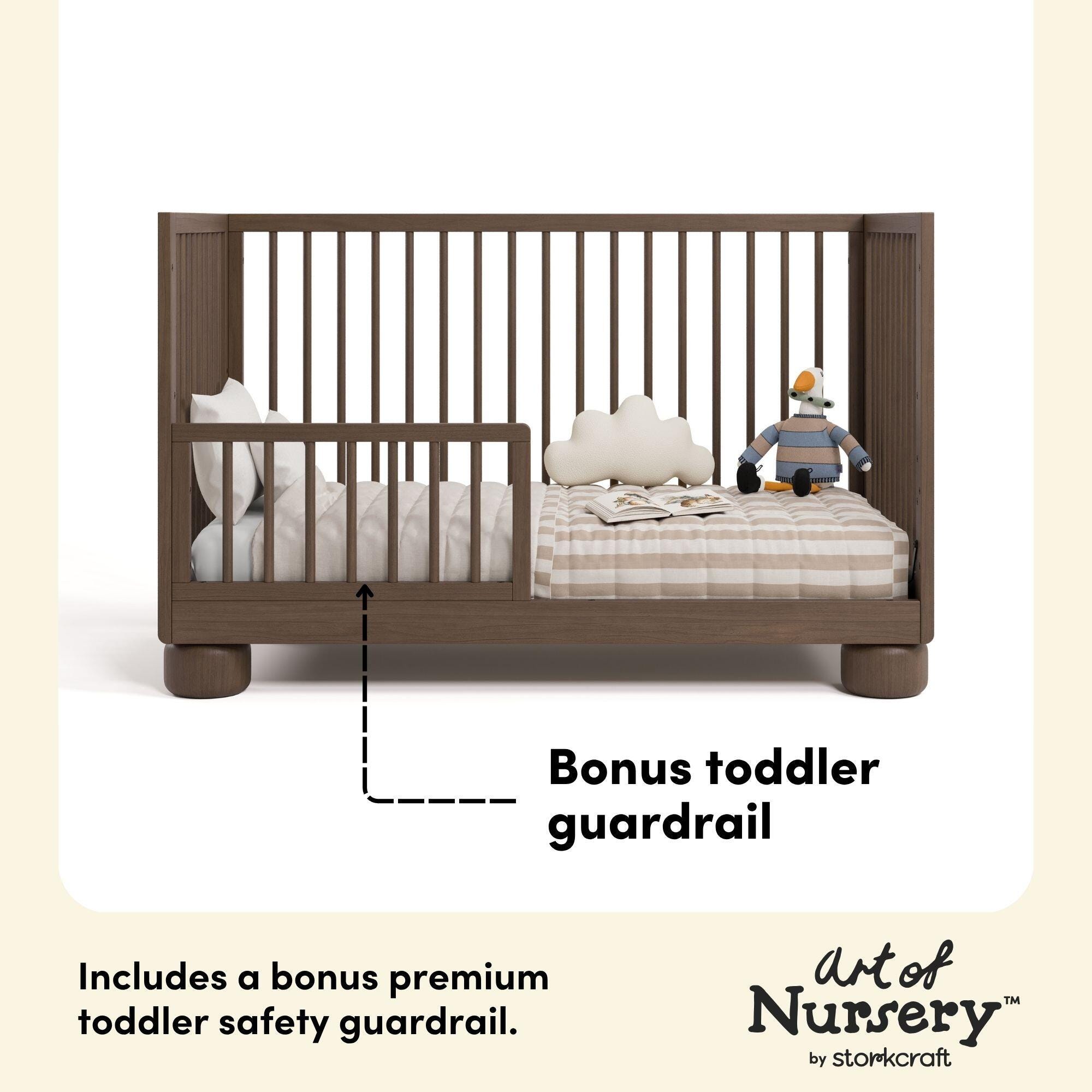 Convertible crib with bonus toddler guardrail.