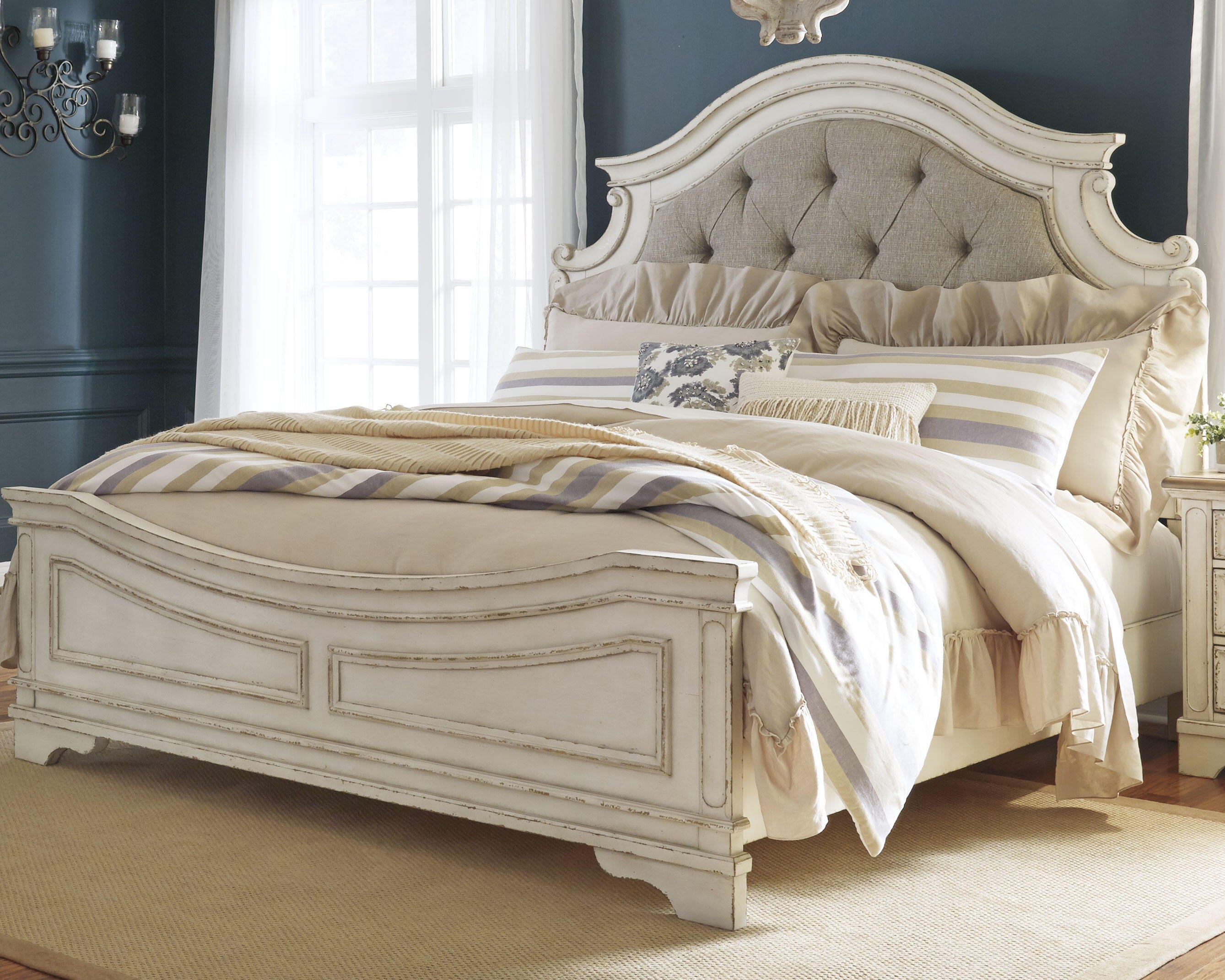 Realyn Queen Upholstered Panel Bed - image 1