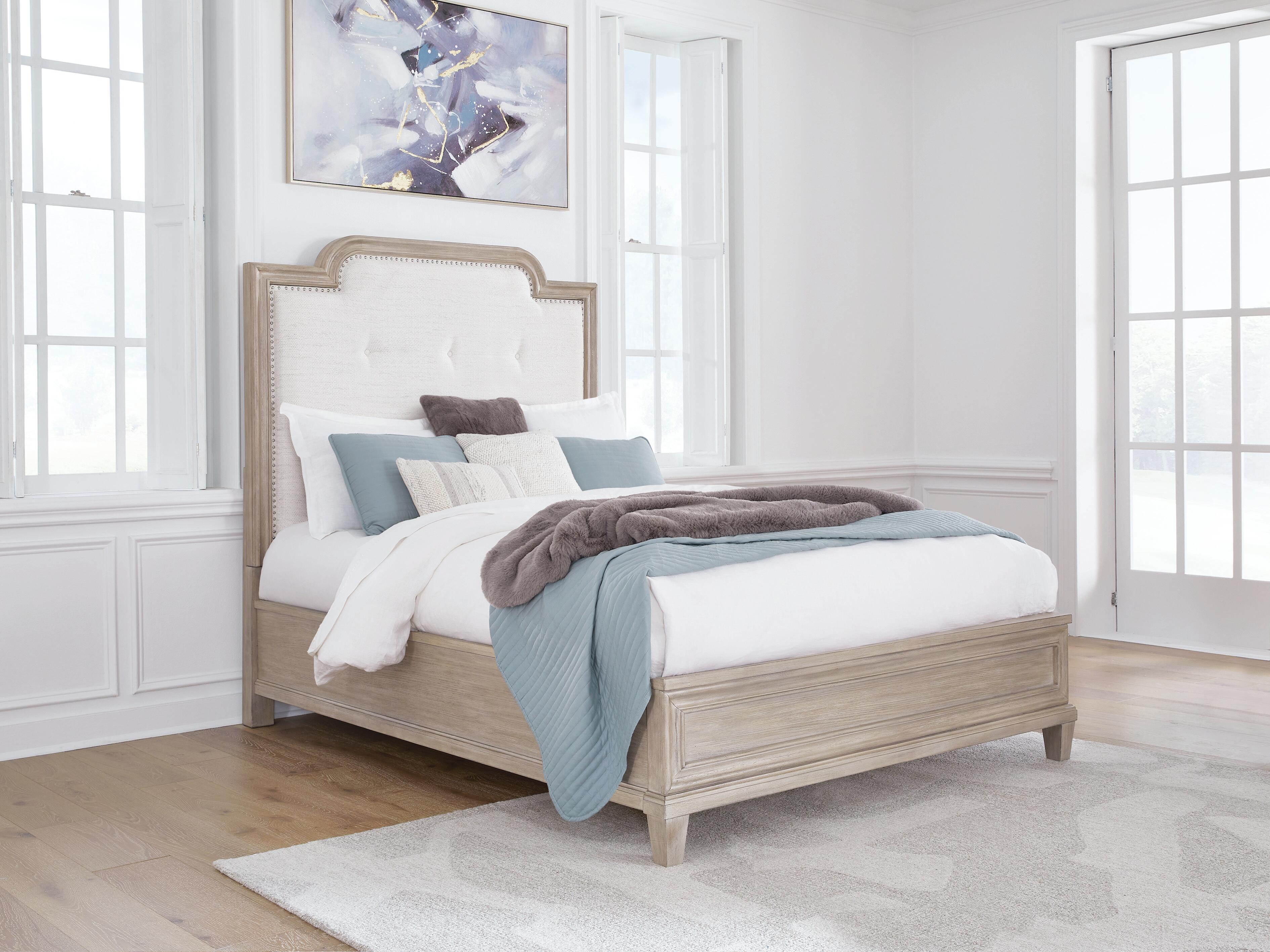 Jorlaina Queen Upholstered Panel Bed - image 1