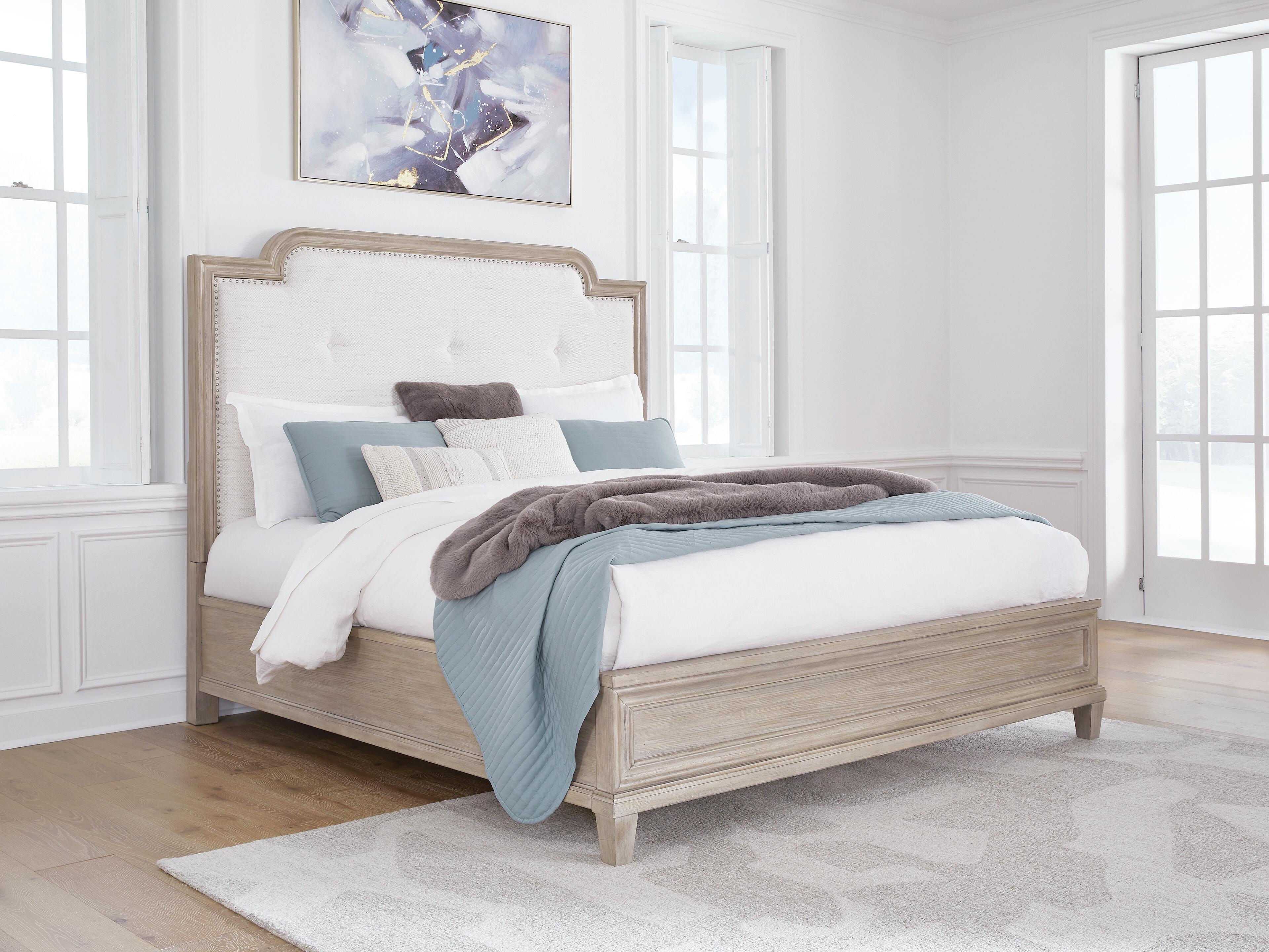 Jorlaina Queen Upholstered Panel Bed - image 1