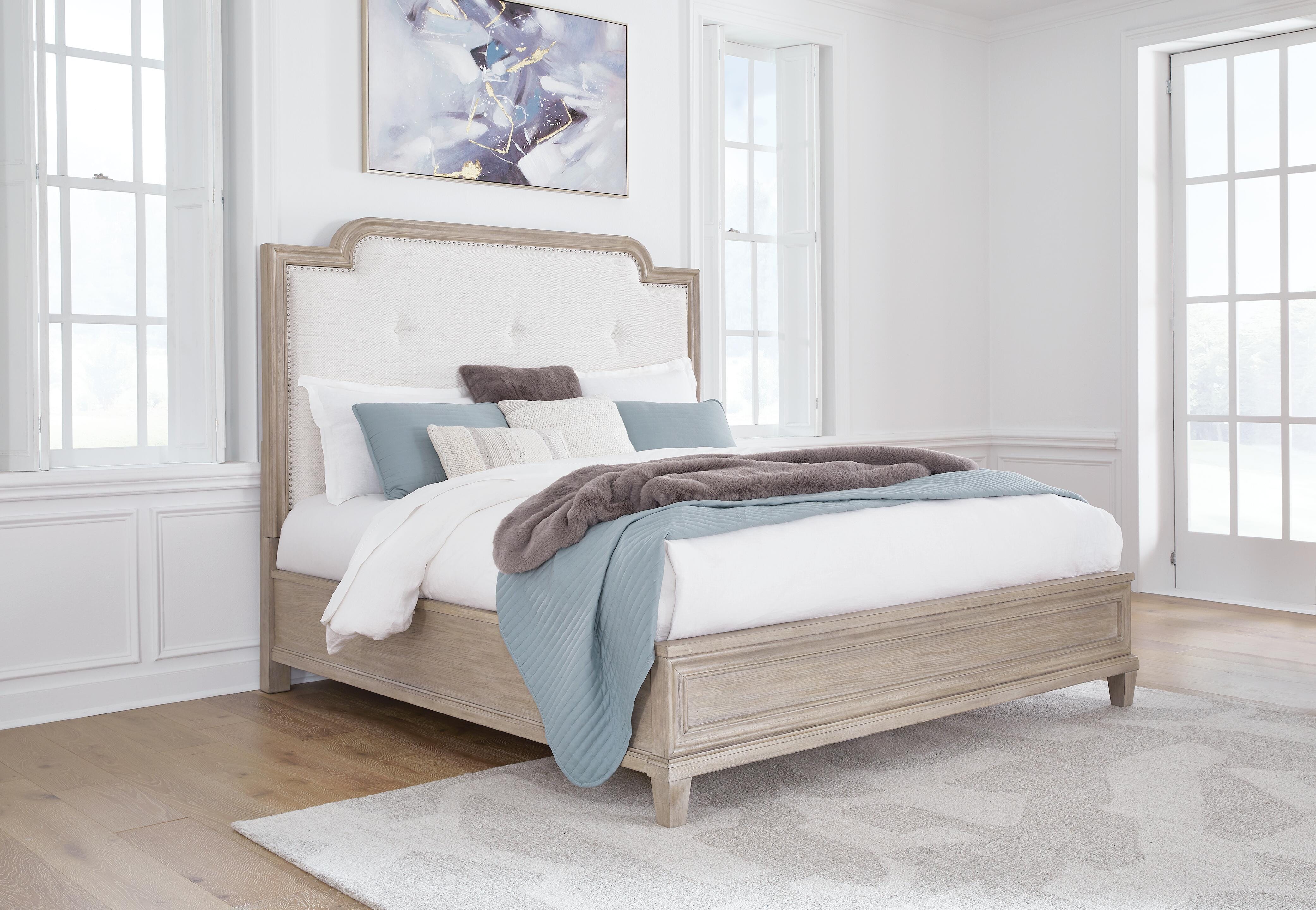 Jorlaina King Upholstered Panel Bed - image 1