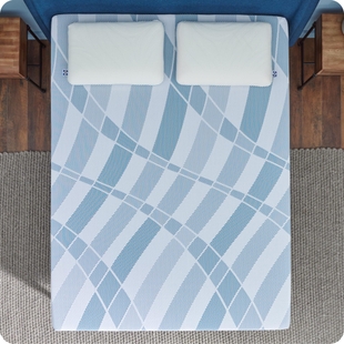 Twin XL mattress in a bedroom setting with side tables.