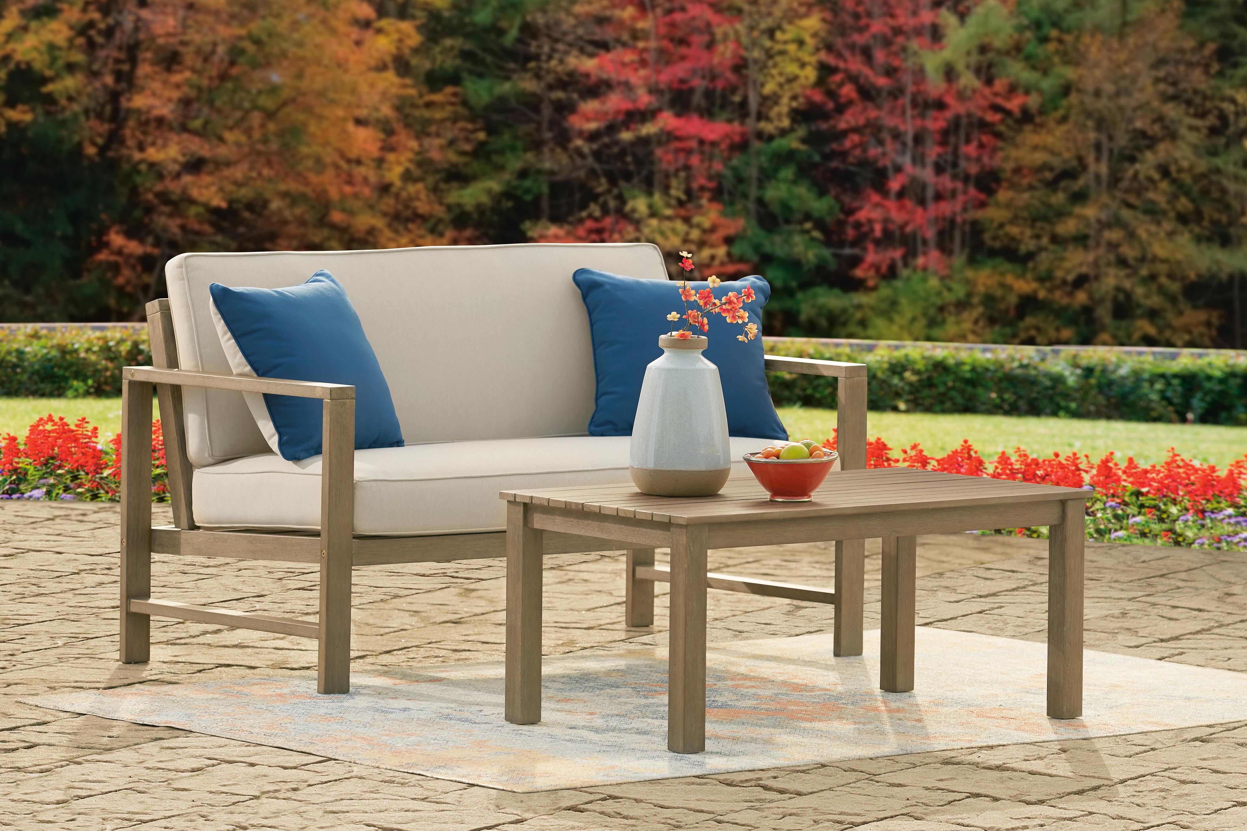 Fynnegan Outdoor Loveseat with Table product photo