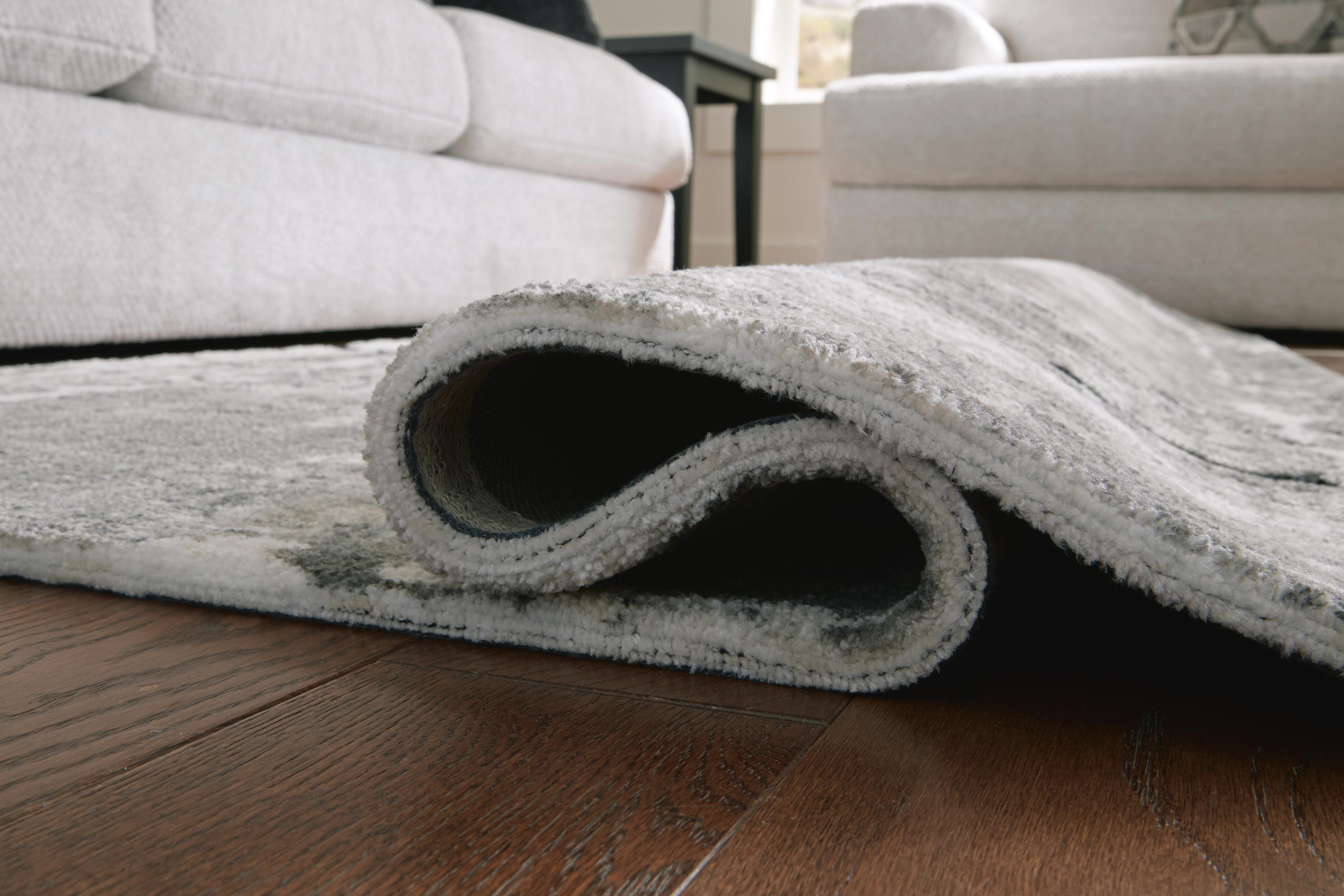 Aworley 5' x 7' Rug | Ashley