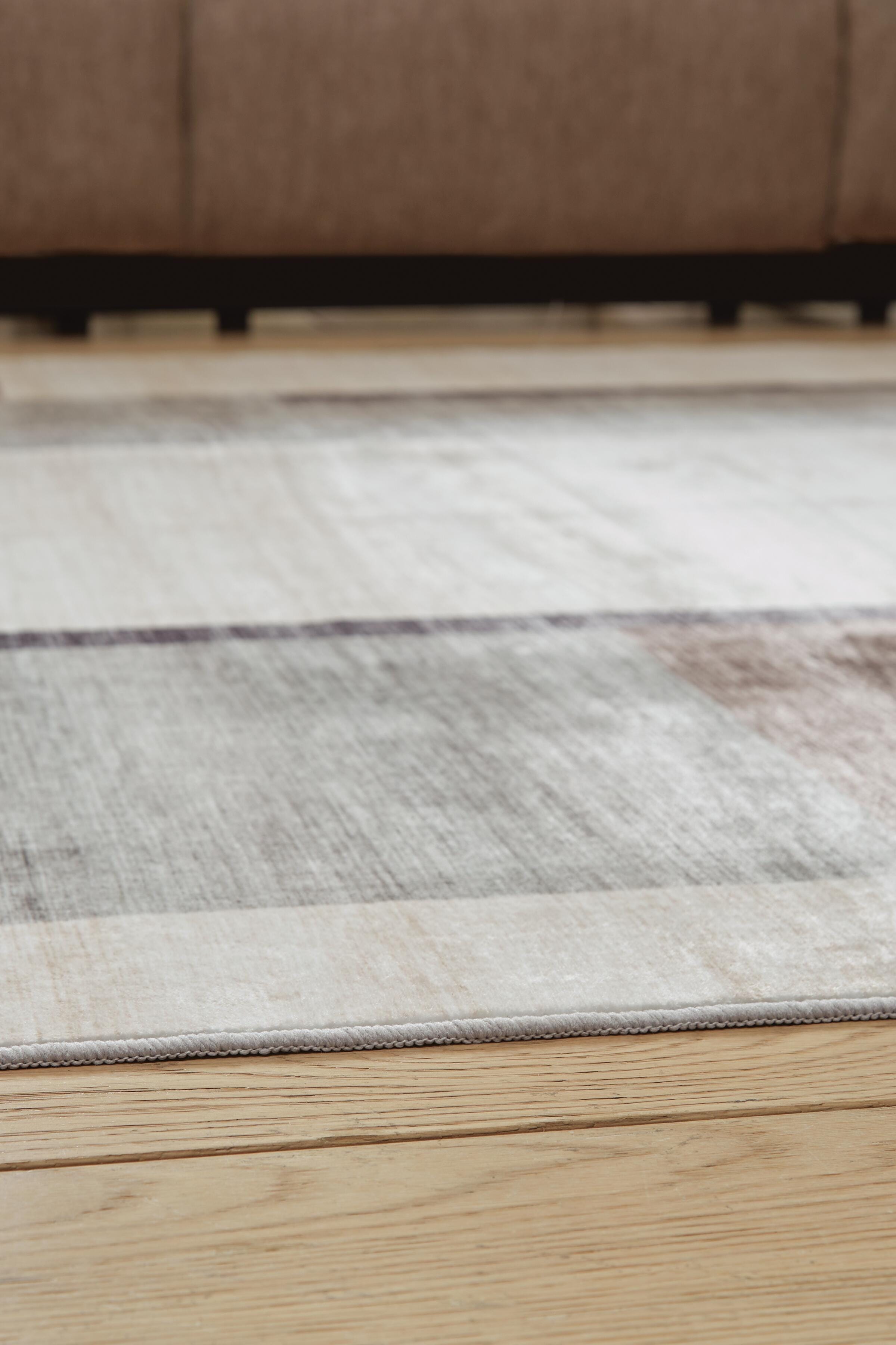 Larkport Washable 5' x 7' Area Rug | Ashley