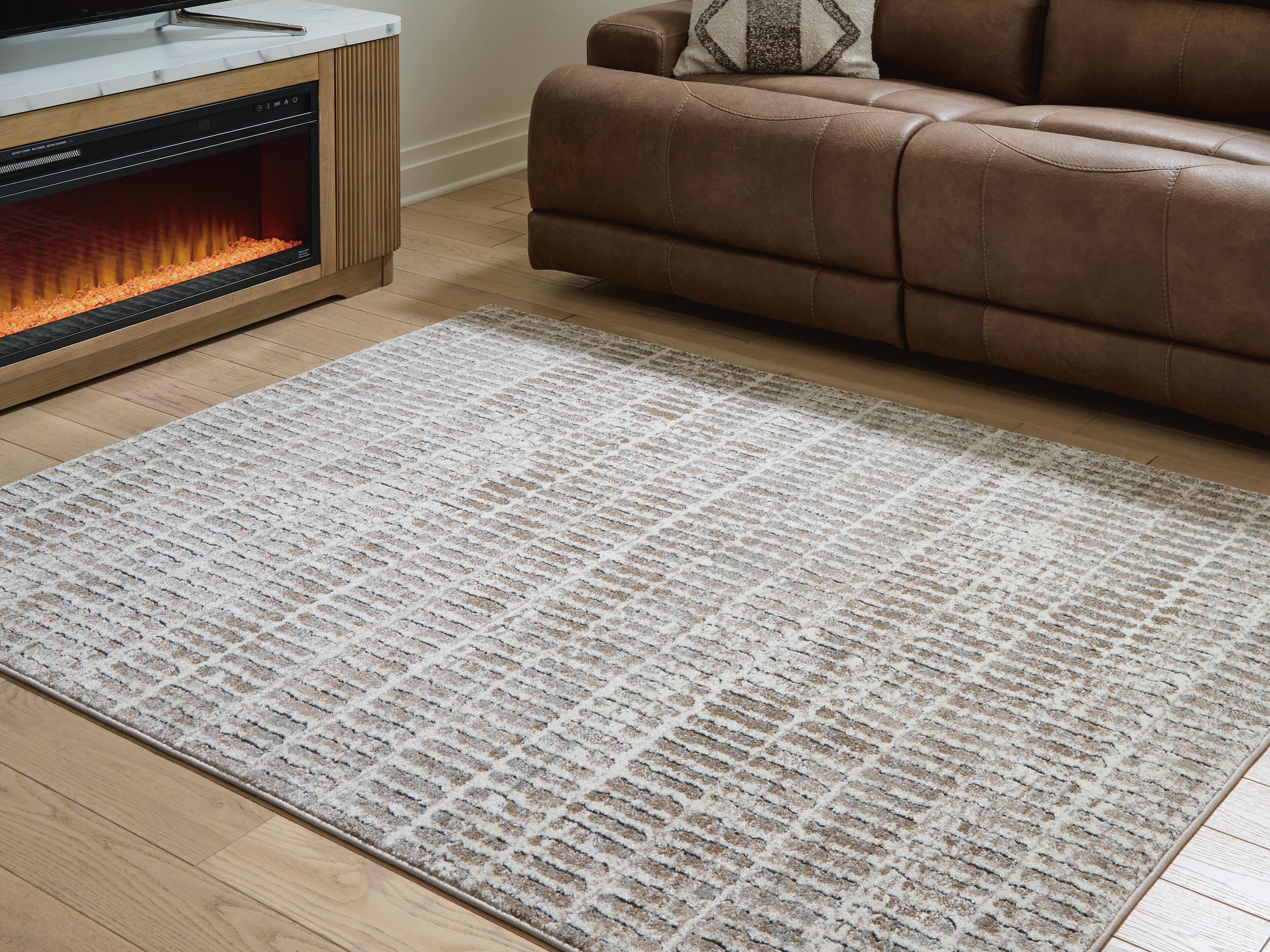 Fuadwick 5'3" x 7' Area Rug - image 1