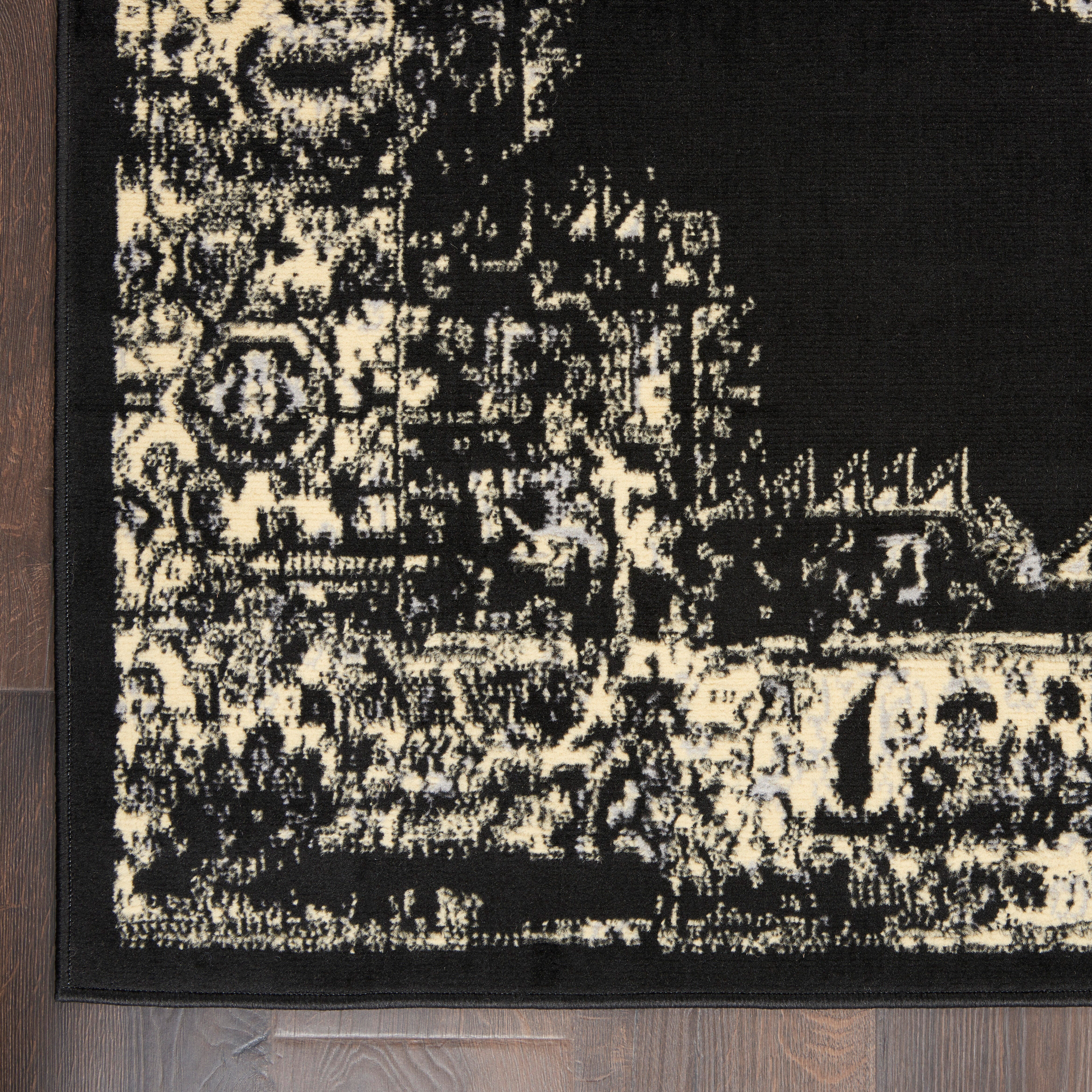 Nourison Home Grafix 2' x 4' Black Vintage Indoor Rug | Ashley