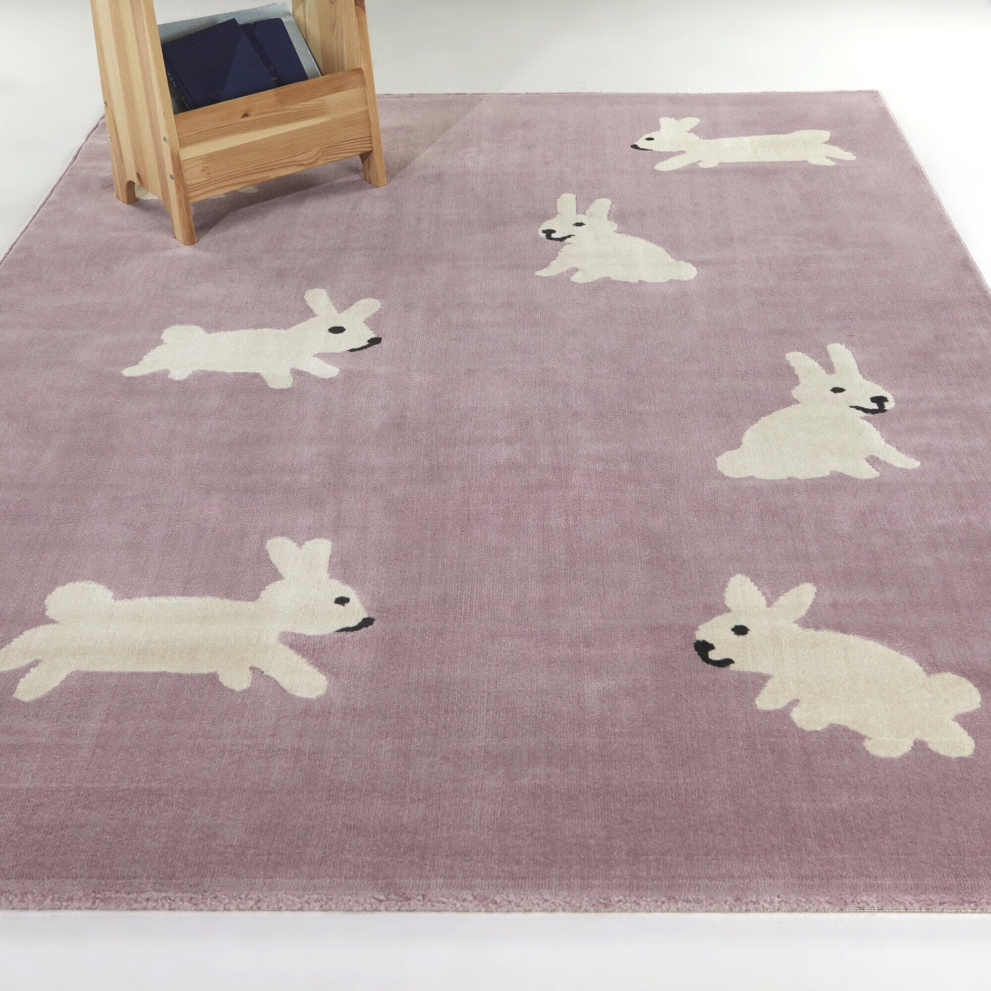 Sullivans Hop Kids Rabbit 4' 4" x 6' Area Rug, Lavender, rollover